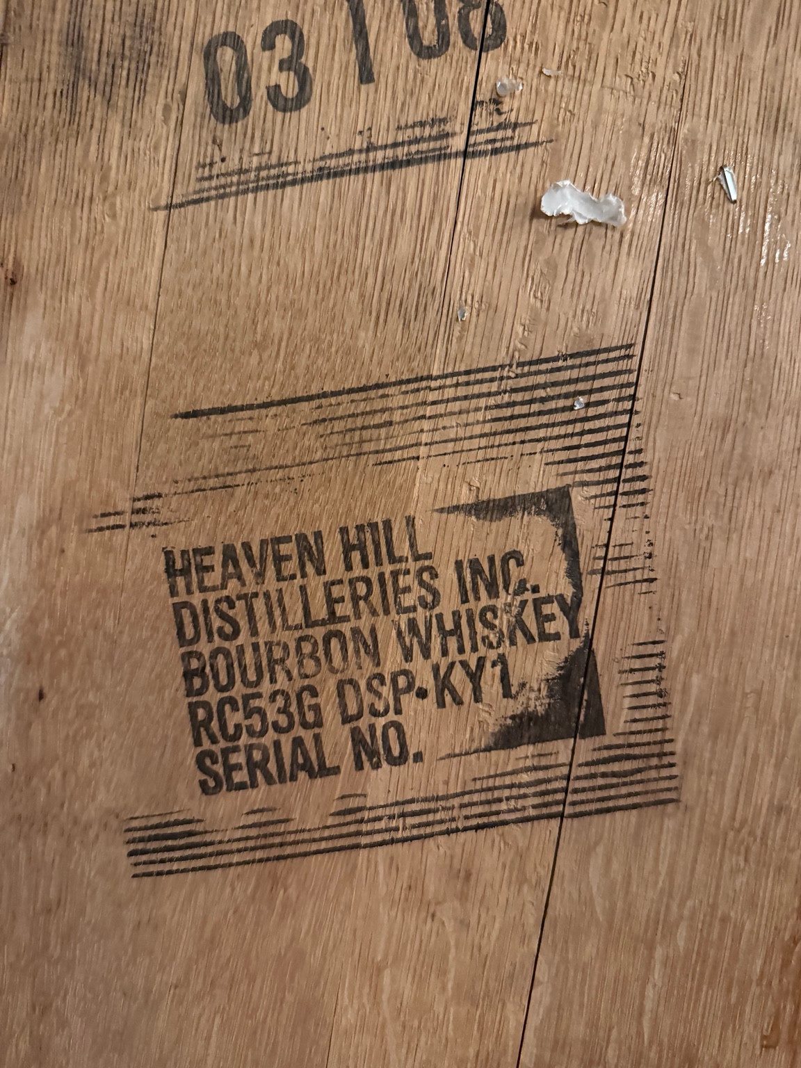 Barrel head marked Heaven Hill Distilleries Inc. and Bourbon Whiskey at Goose Island Barrel House.