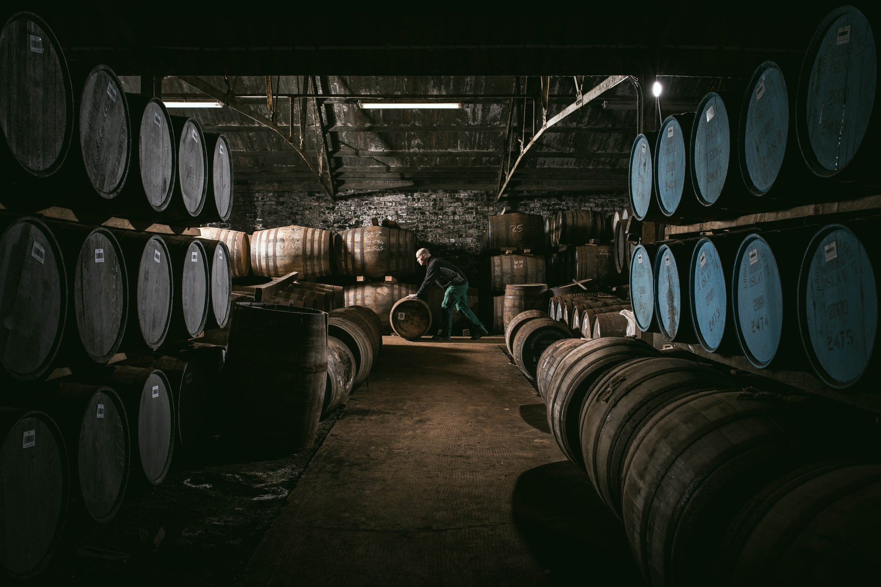 Rows of casks inside an Ardbeg warehouse